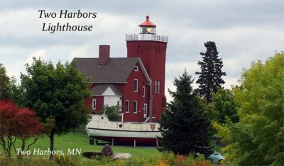 Two Harbors Lighthouse with boat