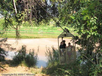 Ashley and Katie riding in the cable car across the Limpopo River from SA into Botswana