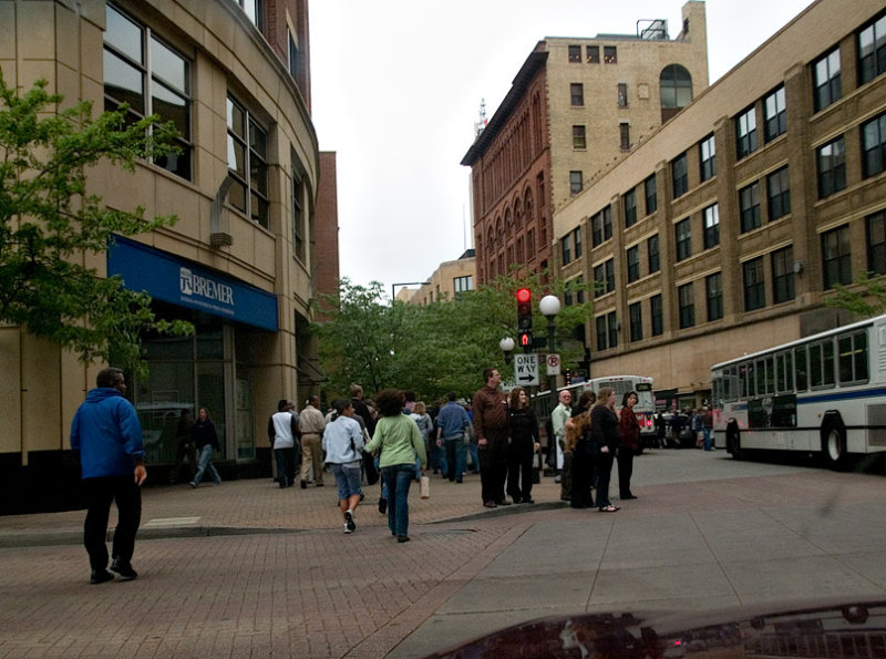 People Coming into Town by Bus