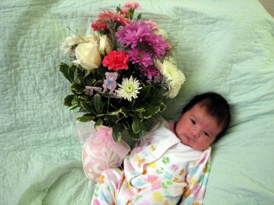 Nicole With Her First Flowers