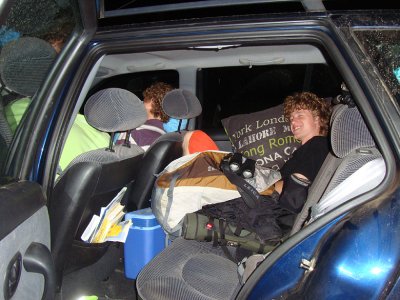 Sleeping in desert in anoverfilled car