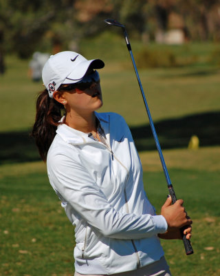 Michelle watches her shot