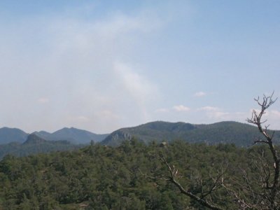 Controlled fire beyond the ridge