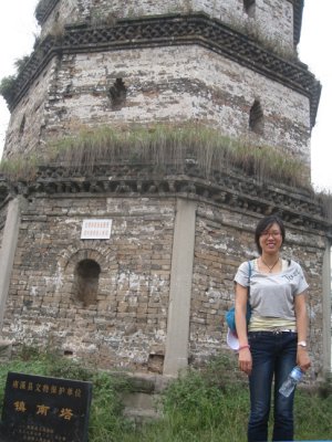Qi Fei in front of old tower