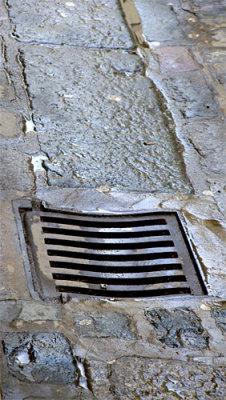 Grating in old road
