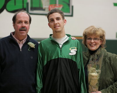 Mike Perrault and his parents Mark and Helen