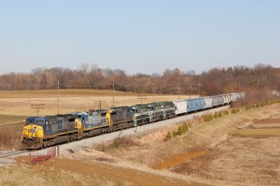 Three GE's lead 3 EVWR EMD's at Belknap. EVWR was delivering the power to the AB Brown spur to return an empty coal drag to Evansville.