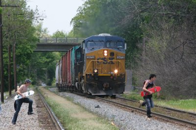 Two young geniuses run in front of a SB train doing about 40 mph through Princeton. And yet it's the photographers who get harrassed for trespassing.