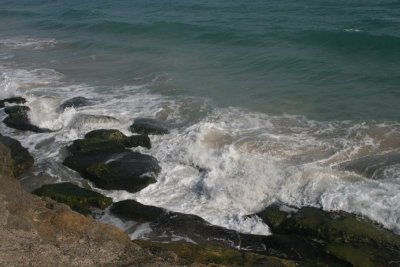 SurfAgainstRocks.jpg
