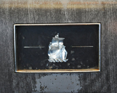 Dashboard emblem in 1951 Plymouth
