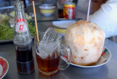 Local coca-cola and coconut juice