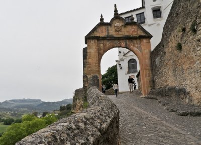Road at Puente Viejo (Old bridge) with arch of Philip V