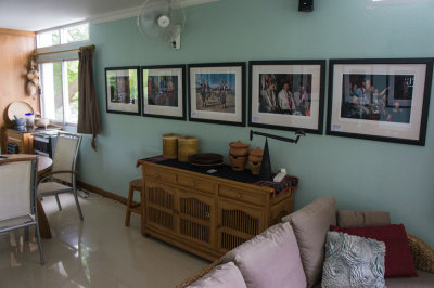 My photographs of Laos on the wall, straight back from the exhibition in Chiang Rai