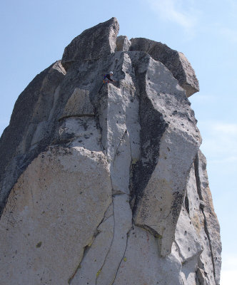 Climber high on Prusik Peak