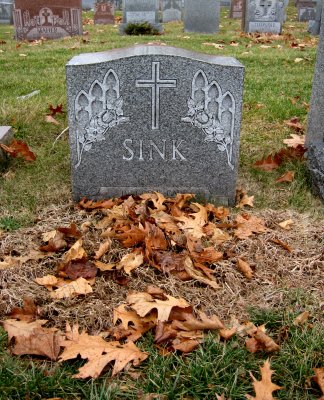 SINK [note: tombstone has sunk]