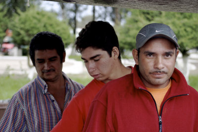 3 men at the market - Costa Rica