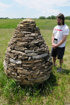 Andy Goldsworthy cairn and Rich.  Cairn is on the left.
