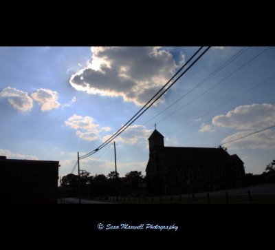 Church Building with Clouds in Sky