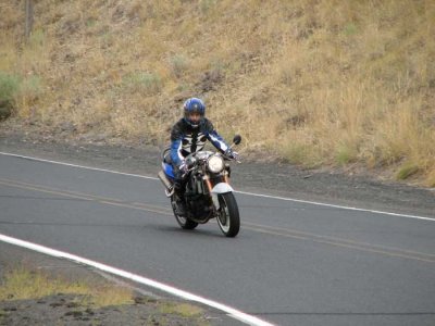 Cyd riding in