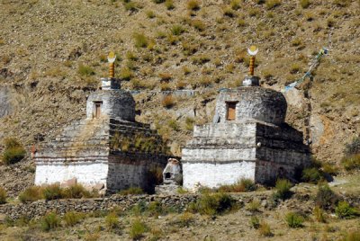 A pair of ancient stupas (chrten) on the shore of Yamdrok-tso Lake just prior to Peldi Dzong