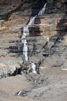 Meltwater from the glacier forming a waterfall