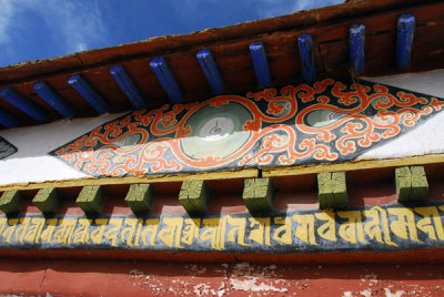 Painted symbols and inscription on the exterior of Gyantse Kumbum