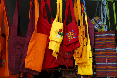 Monk bags at a shop on Buxing Jie street, Shigatse