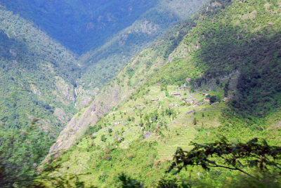 The transition to Nepal is visible with terraced fields built right up to the border