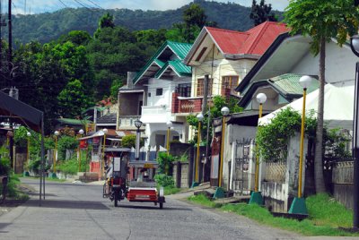 Main road along the north shore of Lake Taal passing through Buco