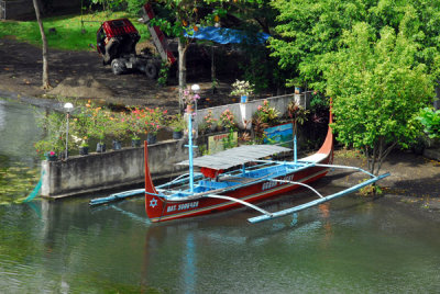 Small outrigger boat typical of Lake Taal and the Philippines