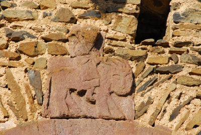 Carving of St. Samuel riding a lion