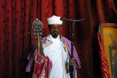 Priest with processional cross and walking stick of King Lalibela