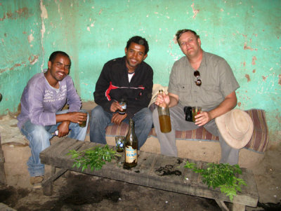 Keith with the guide and driver at the Tej House in Axum
