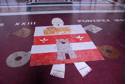 Papal coat-of-arms of Pope John XXIII on the portico floor, St. Peters Basilica