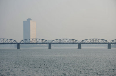 The Yanggakdo Hotel in the distance with the Taedong Bridge