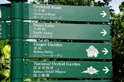Signs pointing out the attractions in Singapore Botanic Gardens