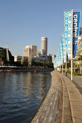 Along the Singapore River in front of Central