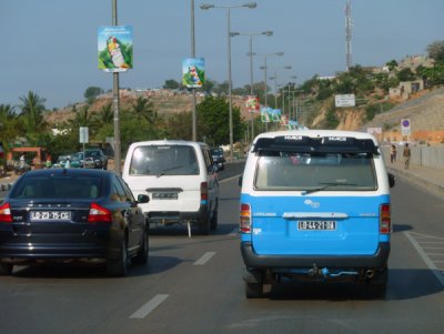 There are no normal taxis in Luanda - either very expensive private cars or very cheap blue minibusses