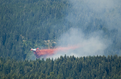 Tanker 17 dropping on the Saddle Fire Monday Morn 10 AM