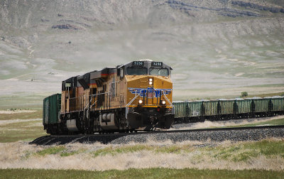 Westbound unit train (loads of gravel?) ascends the grade at Marblehead, Utah