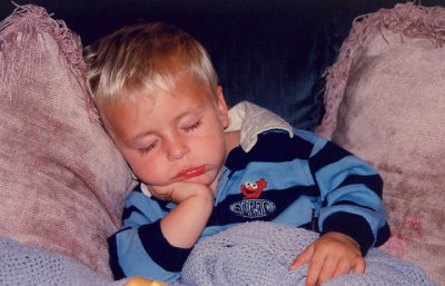 Our Grandson Damon Crashed-Out On The Couch