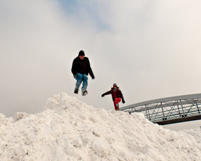 jump from snow pile on Lake Shore Crive