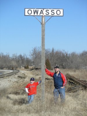 Samuel and Sammy supporting the station sign