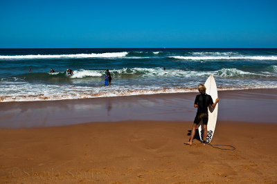Avalon Beach with surfers