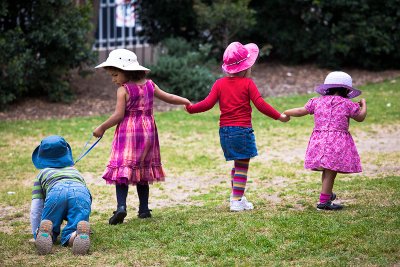 Four children holding hands