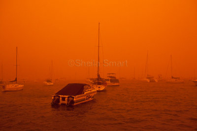 Careel Bay boats in red dust storm