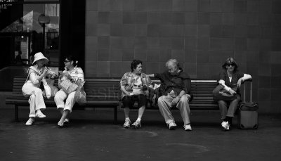People on bench
