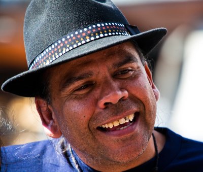 Aboriginal artist in hat