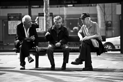 Three men on bench 