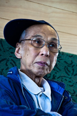 Man with glasses on ferry